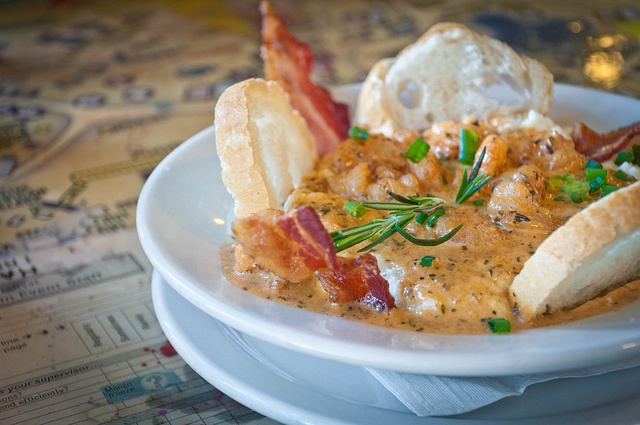 Shrimp n' Grits at Surrey's Cafe and Juice Bar in New Orleans, LA | PopArtichoke